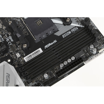 Материнская плата Asrock B550M PRO4 Soc-AM4 AMD B550 4xDDR4 mATX AC`97 8ch(7.1) GbLAN RAID+VGA+HDMI+DP 